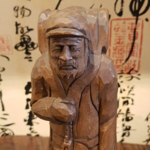旅遊老人木雕